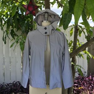 Holographic deadstock rain jacket by TradeMark